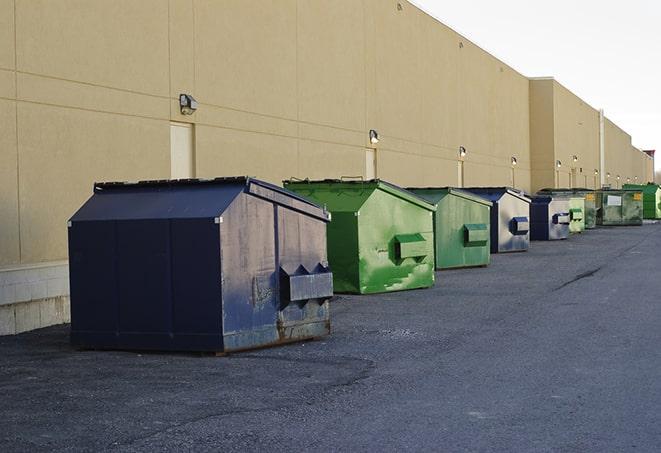 dumpsters with safety cones in a construction area in Beavercreek